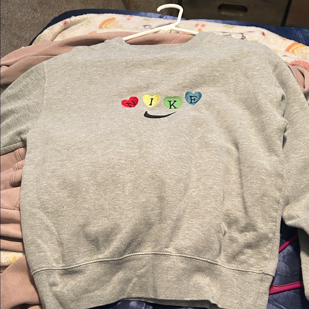 Nike Gray Sweatshirt with Multicolor Heart Accents will negotiate price